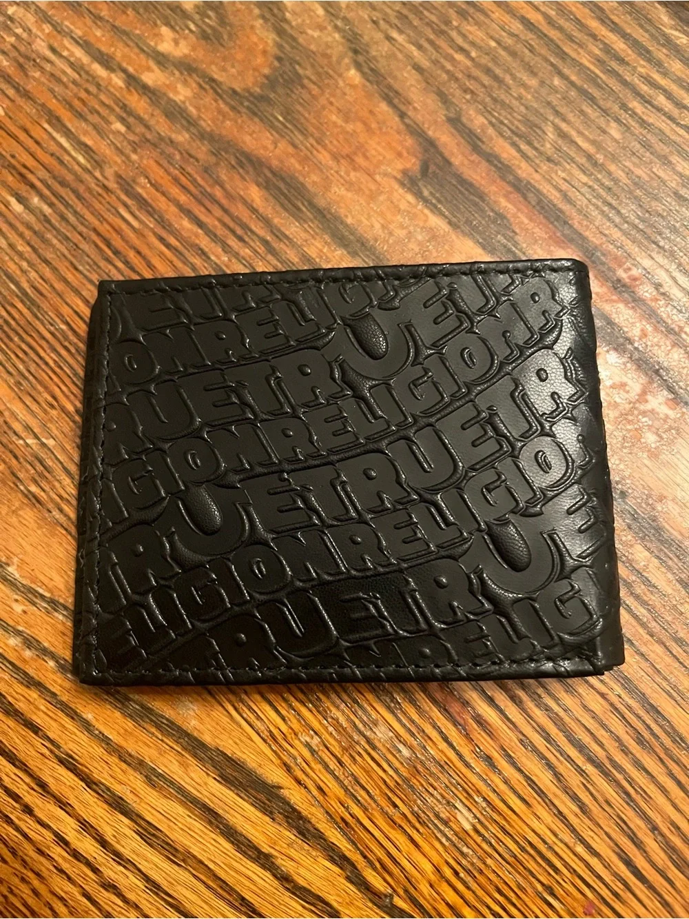 True Religion Black Embossed Leather Bifold Card Holder